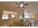 Open concept dining room, kitchen, and living room with modern furnishings at 4619 Forest Wood Trl # 7, Sarasota, FL 34241