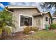 Well-maintained exterior with attractive landscaping at 4619 Forest Wood Trl # 7, Sarasota, FL 34241