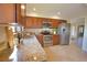 Spacious kitchen with ample cabinet space and granite countertops at 4619 Forest Wood Trl # 7, Sarasota, FL 34241