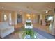 Living room showcasing a built-in wet bar and open layout at 4619 Forest Wood Trl # 7, Sarasota, FL 34241