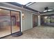 Patio with view of kitchen and golf course at 4619 Forest Wood Trl # 7, Sarasota, FL 34241