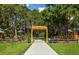 Colorful playground with shaded areas and accessible features at 4695 W Price Blvd, North Port, FL 34286
