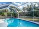 Relax and enjoy this beautiful screened pool and patio area at 4695 W Price Blvd, North Port, FL 34286