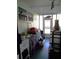 Utility/storage Florida room with various items at 476 Boxwood Dr, Venice, FL 34285