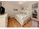 Bright bedroom with a comfortable bed and plenty of closet space at 487 Summerfield Way, Venice, FL 34292