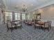 Clubhouse dining room with tables and chairs at 487 Summerfield Way, Venice, FL 34292