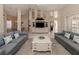 Open concept living room with a view of the kitchen at 487 Summerfield Way, Venice, FL 34292