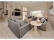Spacious living room with vaulted ceilings and comfortable seating at 487 Summerfield Way, Venice, FL 34292