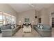 Spacious living room with access to the pool area at 487 Summerfield Way, Venice, FL 34292
