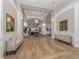 Elegant clubhouse lobby with seating and wood floors at 487 Summerfield Way, Venice, FL 34292