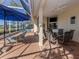 Relaxing pool and spa area with covered patio at 487 Summerfield Way, Venice, FL 34292
