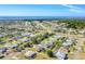 Aerial view of property and surrounding neighborhood at 49 Perimeter Dr, Englewood, FL 34223