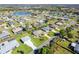 Aerial view of property and neighborhood near water at 49 Perimeter Dr, Englewood, FL 34223