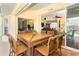 Spacious lanai with wicker furniture, perfect for outdoor dining at 49 Perimeter Dr, Englewood, FL 34223