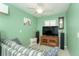 Relaxing media room with comfortable seating and large TV at 49 Perimeter Dr, Englewood, FL 34223