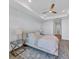 Main bedroom with a king-size bed and water views at 503 N Tamiami Trl # 301, Venice, FL 34285