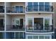 Private balcony with water views and access to condo amenities at 503 N Tamiami Trl # 301, Venice, FL 34285