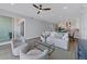 Relaxing living room with comfortable seating and access to balcony at 503 N Tamiami Trl # 301, Venice, FL 34285
