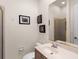 Small bathroom with sink, toilet and shower at 5031 Bella Terra Dr, Venice, FL 34293