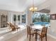 Casual breakfast nook with pool and garden view at 5031 Bella Terra Dr, Venice, FL 34293