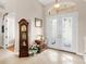 Bright entryway with double doors and decorative floor at 5031 Bella Terra Dr, Venice, FL 34293