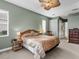 Comfortable main bedroom with king-size bed and ample closet space at 5031 Bella Terra Dr, Venice, FL 34293