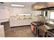 Community kitchen with stainless steel appliances at 521 Roma Road, Venice, FL 34285