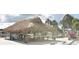Relax under a thatched roof tiki hut at 521 Roma Road, Venice, FL 34285
