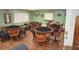 Community game room with card tables at 521 Roma Road, Venice, FL 34285