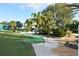 Community mini golf course with lush landscaping at 521 Roma Road, Venice, FL 34285