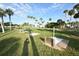 Spacious RV park with grassy sites and palm trees at 521 Roma Road, Venice, FL 34285