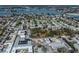 Scenic aerial view of a coastal community near a serene bay, showcasing nearby apartment complex and residential areas at 525 Manatee Ct # 4, Venice, FL 34285