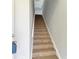 Interior photo of a carpeted staircase leading upstairs at 5541 Rosehill Rd # 201, Sarasota, FL 34233