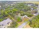 Property view showcasing house and extensive land at 610 Woodview Way, Bradenton, FL 34212