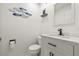 Stylish bathroom with marble vanity and a modern toilet at 610 Woodview Way, Bradenton, FL 34212