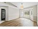 Spacious dining area with large window and wood-look floors at 610 Woodview Way, Bradenton, FL 34212
