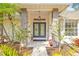 House entrance with double doors and decorative glass at 610 Woodview Way, Bradenton, FL 34212