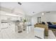 Modern kitchen with breakfast bar and stainless steel appliances at 610 Woodview Way, Bradenton, FL 34212