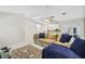 Comfortable living room with sectional sofa and access to the pool at 610 Woodview Way, Bradenton, FL 34212