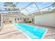 Inviting swimming pool with screened enclosure at 610 Woodview Way, Bradenton, FL 34212