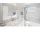 Clean bathroom with a shower/tub combo and white vanity at 6213 Green View Dr # 127, Sarasota, FL 34231