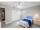 Bedroom with sliding door closet and a twin bed at 6213 Green View Dr # 127, Sarasota, FL 34231