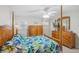Bedroom with a post bed and dresser at 6213 Green View Dr # 127, Sarasota, FL 34231