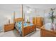 Main bedroom with a post bed and ample storage at 6213 Green View Dr # 127, Sarasota, FL 34231