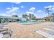 Relaxing community pool with plenty of lounge chairs at 6213 Green View Dr # 127, Sarasota, FL 34231