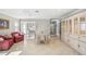 Bright dining room with white table and chairs, and built-in hutch at 6213 Green View Dr # 127, Sarasota, FL 34231