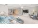 Living room with sectional sofa and built-in shelving at 6213 Green View Dr # 127, Sarasota, FL 34231