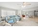 Open living room with views into adjacent dining area at 6213 Green View Dr # 127, Sarasota, FL 34231