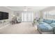 Bright living room featuring comfy seating and access to a patio at 6213 Green View Dr # 127, Sarasota, FL 34231