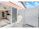 Small patio with lounge chair and view of the kitchen at 6213 Green View Dr # 127, Sarasota, FL 34231